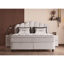 Lit Cali — Boxspring velours à tête galbée