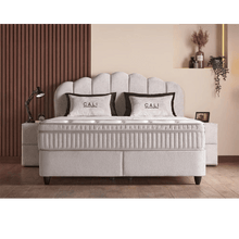 Lit Cali — Boxspring velours à tête galbée