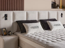 Lit Lennon — Boxspring bouclé à coffres et liseuses