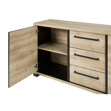 Salle à manger Rico (bi-ton Arizona Oak & Nero), petit buffet porte ouverte montrant l'étagère intérieure et les tiroirs chêne clair