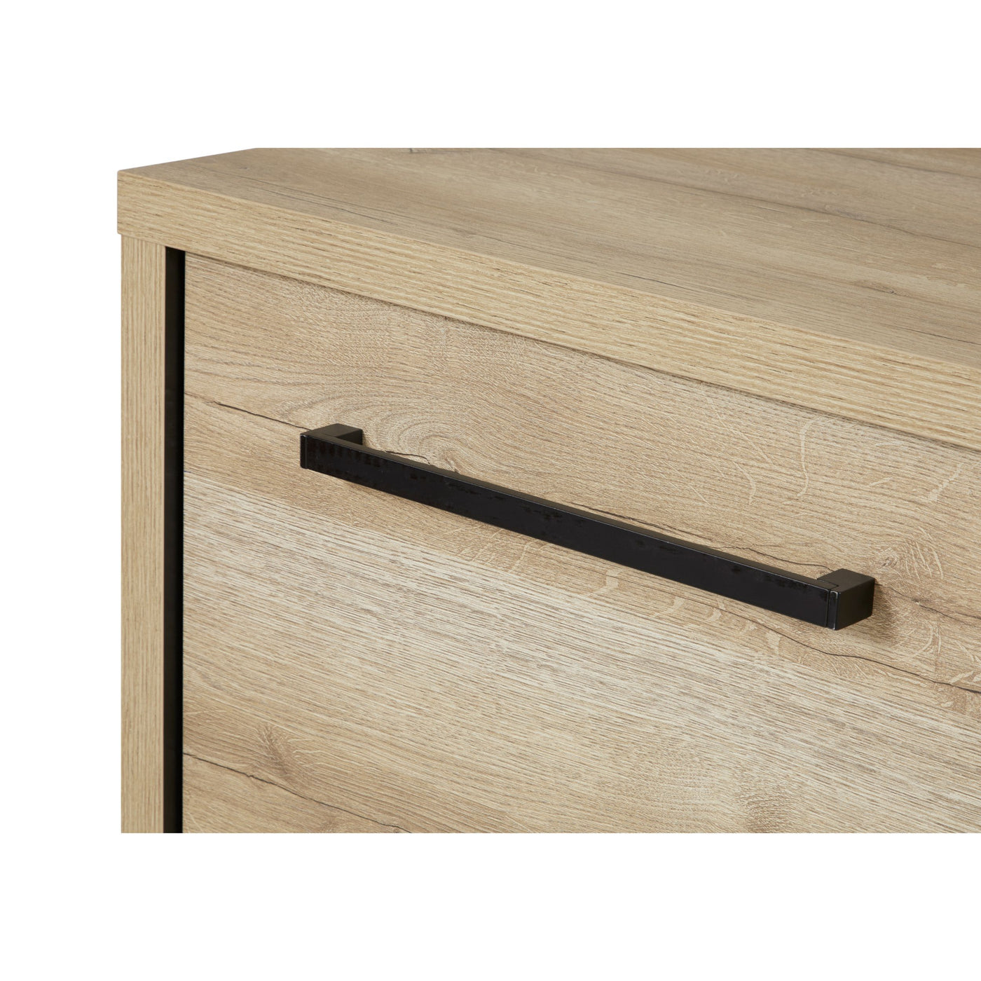 Salle à manger Rico (bi-ton Arizona Oak & Nero), gros plan sur une poignée barre noire et l'angle chêne clair d'un meuble